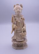 A 19th century Chinese carved ivory chess piece. 9 cm high.