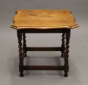 An early 20th century oak barley twist coffee table