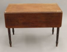 A 19th century mahogany Pembroke table. 101 cm long.