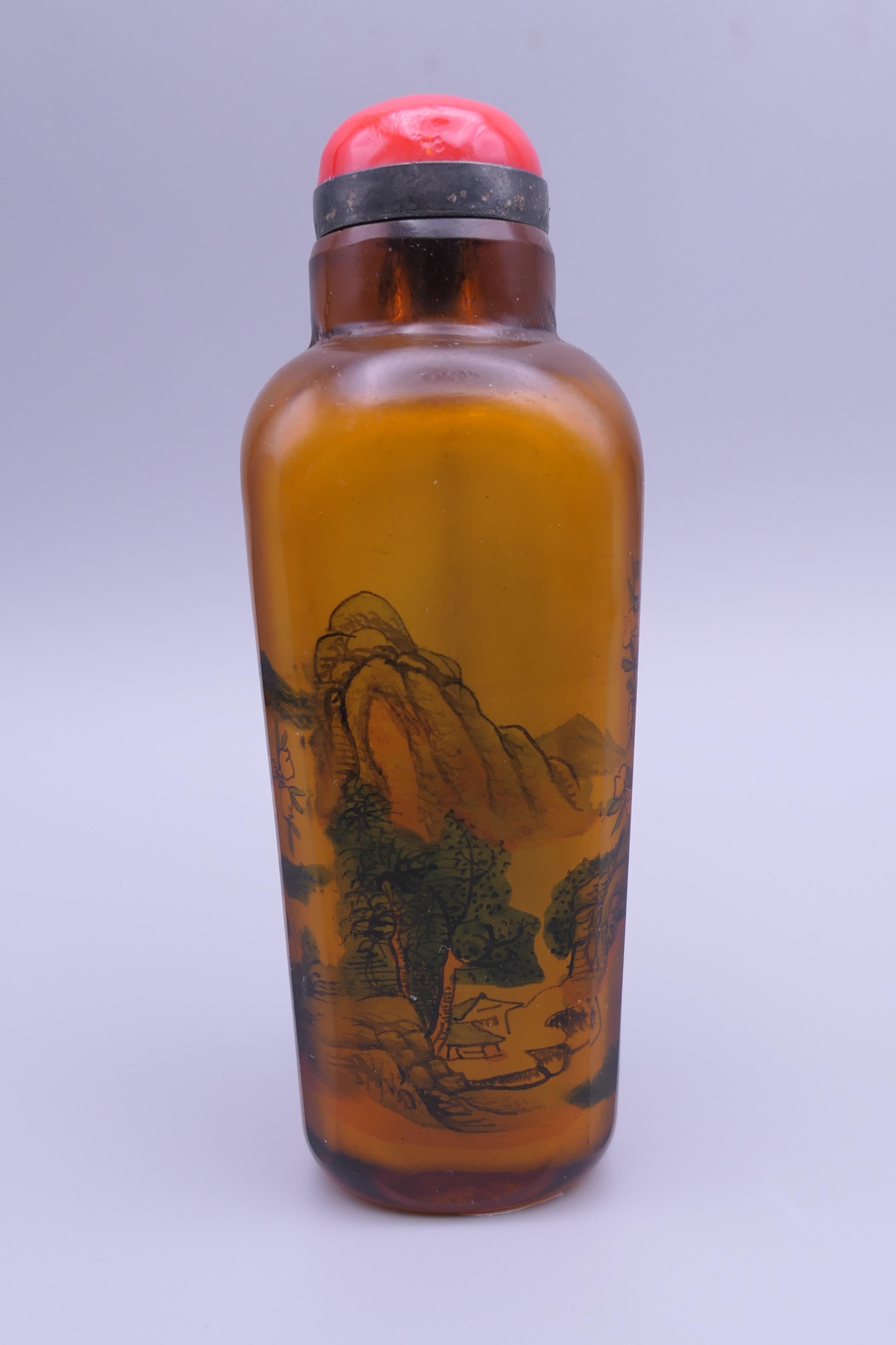 A Chinese smoky coloured interior painted snuff bottle and stopper. 11.5 cm high. - Image 2 of 6