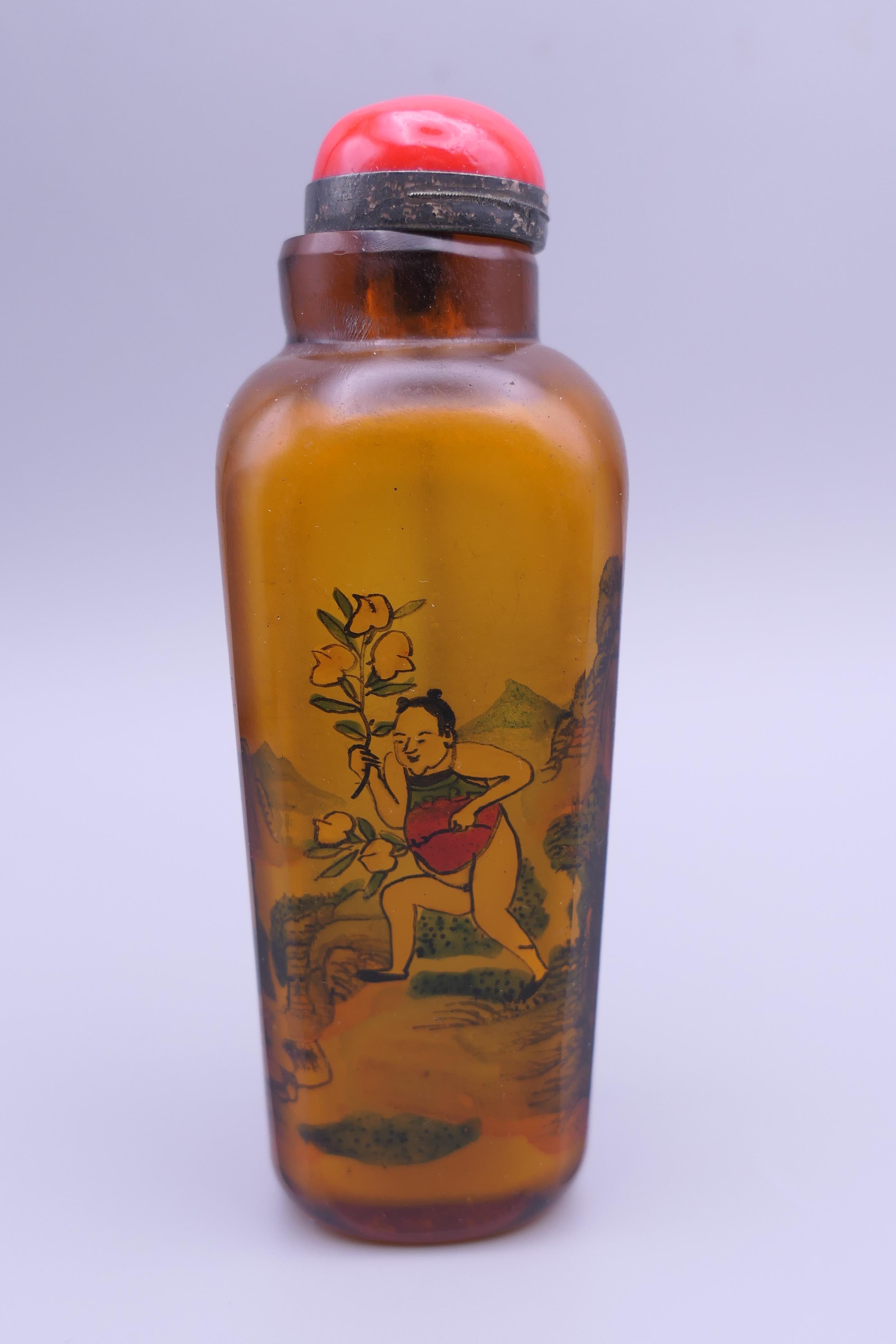 A Chinese smoky coloured interior painted snuff bottle and stopper. 11.5 cm high. - Image 3 of 6