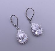 A pair of 925 sterling silver cubic zirconia teardrop earrings. Teardrop 1.5 cm high.