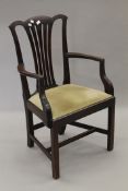 A 19th century mahogany open armchair. 57 cm wide.