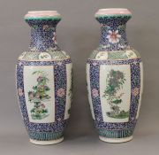 A pair of Chinese porcelain vases. 46 cm high.