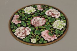 A circular cloisonne panel. 33 cm diameter.