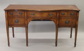 A 19th century mahogany Serpentine sideboard. 165 cm wide.