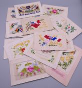 Seventeen World War I embroidered silk postcards including some with note cards.