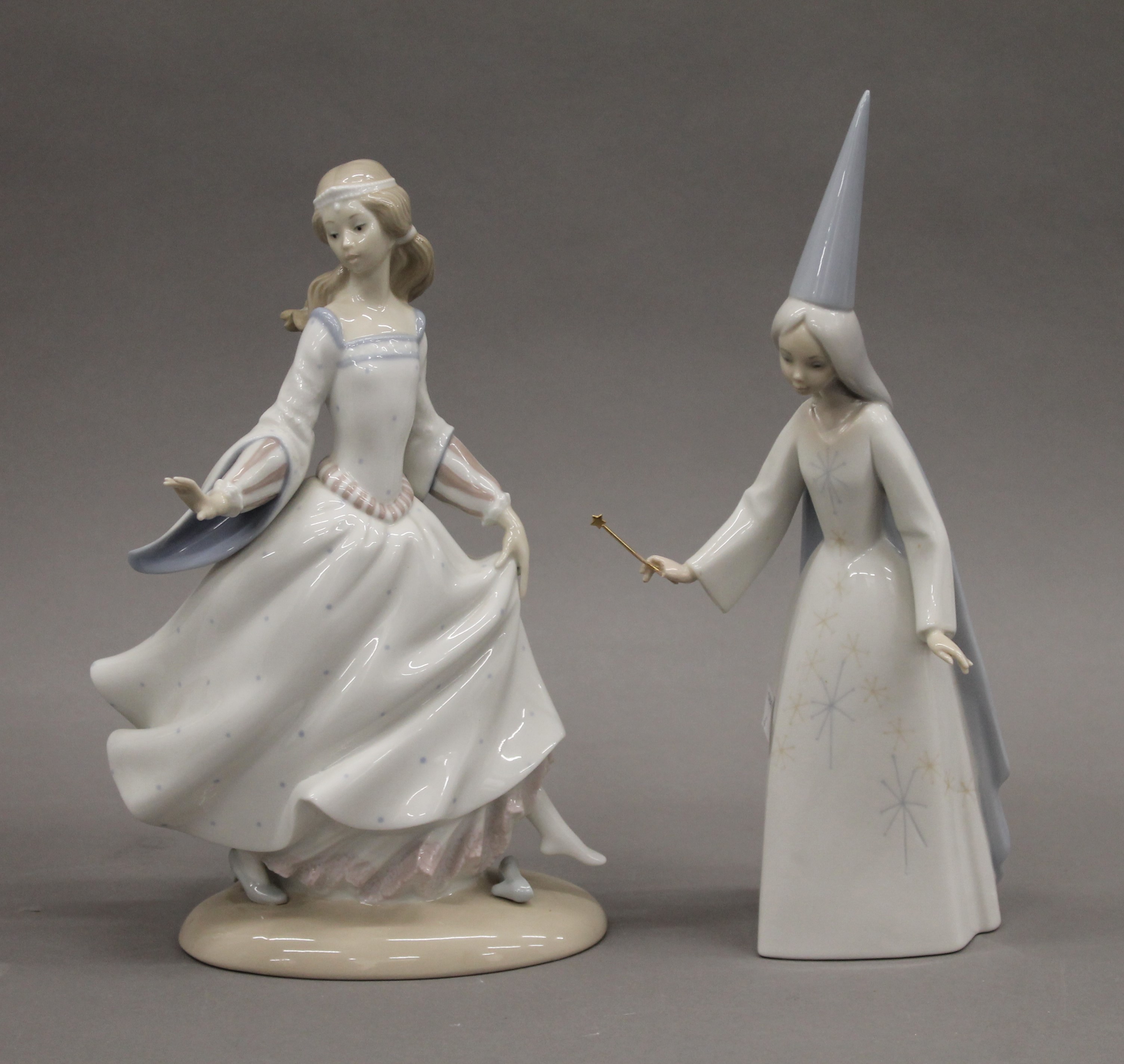 Two Lladro figures: Cinderella and The Fairy Godmother.