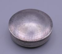 A Dutch silver patch box. 4.5 cm diameter.