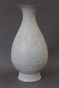 A Chinese blanc de chine vase. 33 cm high.