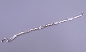 A vintage 925 silver and mother-of-pearl bracelet. 17.5 cm long.