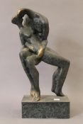 An abstract patinated bronze sculpture of a nude couple. 45 cm high.