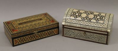 Two bone and mother-of-pearl inlaid boxes. The largest 27 cm wide.