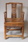 A pair of Chinese carved open armchairs. 60.5 cm wide.