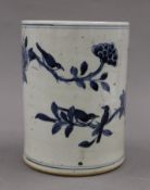 A Chinese porcelain blue and white brush pot. 16.5 cm high.