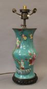 A Chinese porcelain turquoise vase, converted to a lamp. 54 cm high.