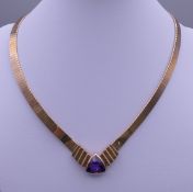 A 14 ct gold amethyst set necklace. 41 cm long. 36.1 grammes total weight.