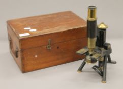 A cased J Swift brass microscope. The case 30.5 cm wide.