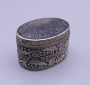 A Persian seal top box. 2 cm high.