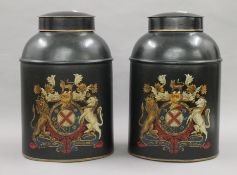 A pair of black tea tins. 34 cm high.