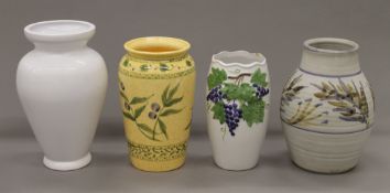 A Prickwillow pottery vase and three others. The former 23 cm high.