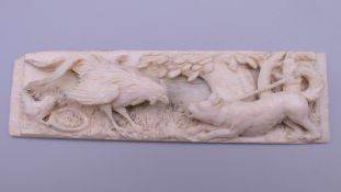 A 19th century French carved ivory panel. 13 cm wide.