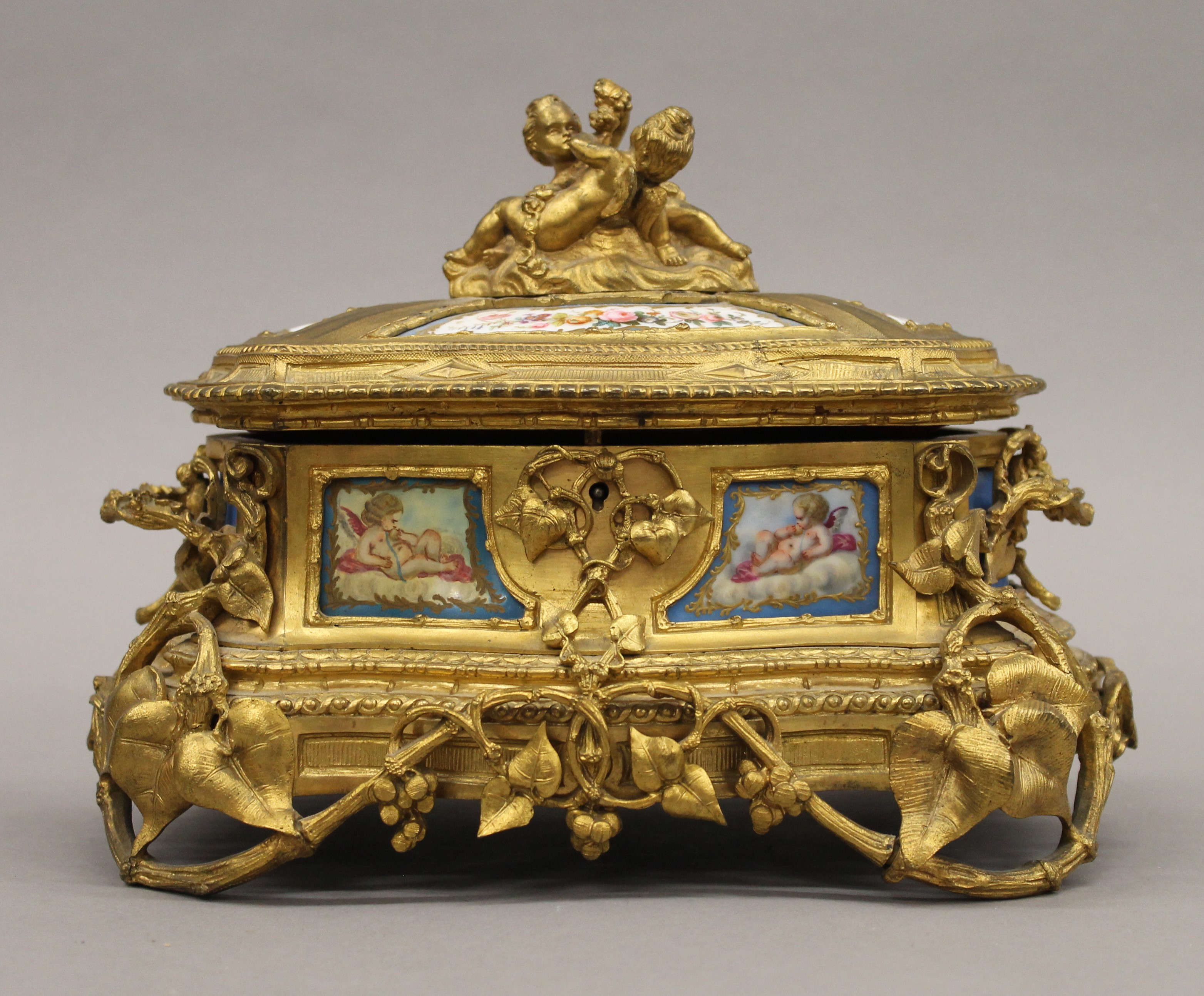 A 19th century Continental painted porcelain mounted ormolu casket. 25 cm wide. - Image 2 of 7