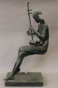 An abstract bronze model of a broken girl. 88 cm high.