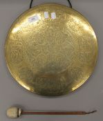 A brass hanging gong. 35.5 cm diameter.