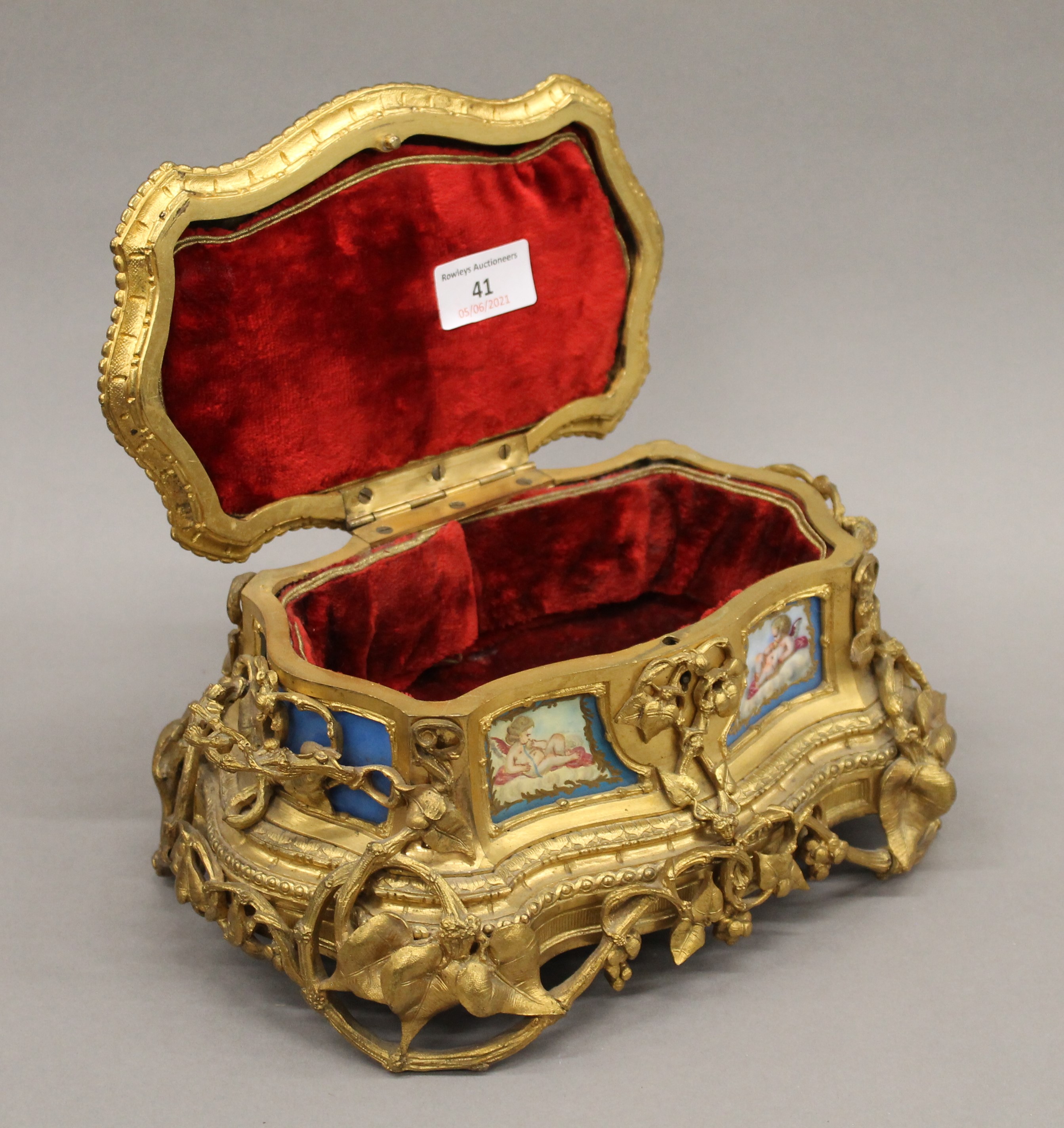 A 19th century Continental painted porcelain mounted ormolu casket. 25 cm wide. - Image 5 of 7