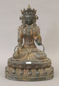 A large bronze model of buddha. 35 cm high.