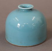 A Chinese light blue porcelain beehive brush pot. 8 cm high.