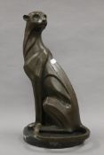 A bronze model of a cheetah. 43 cm high.