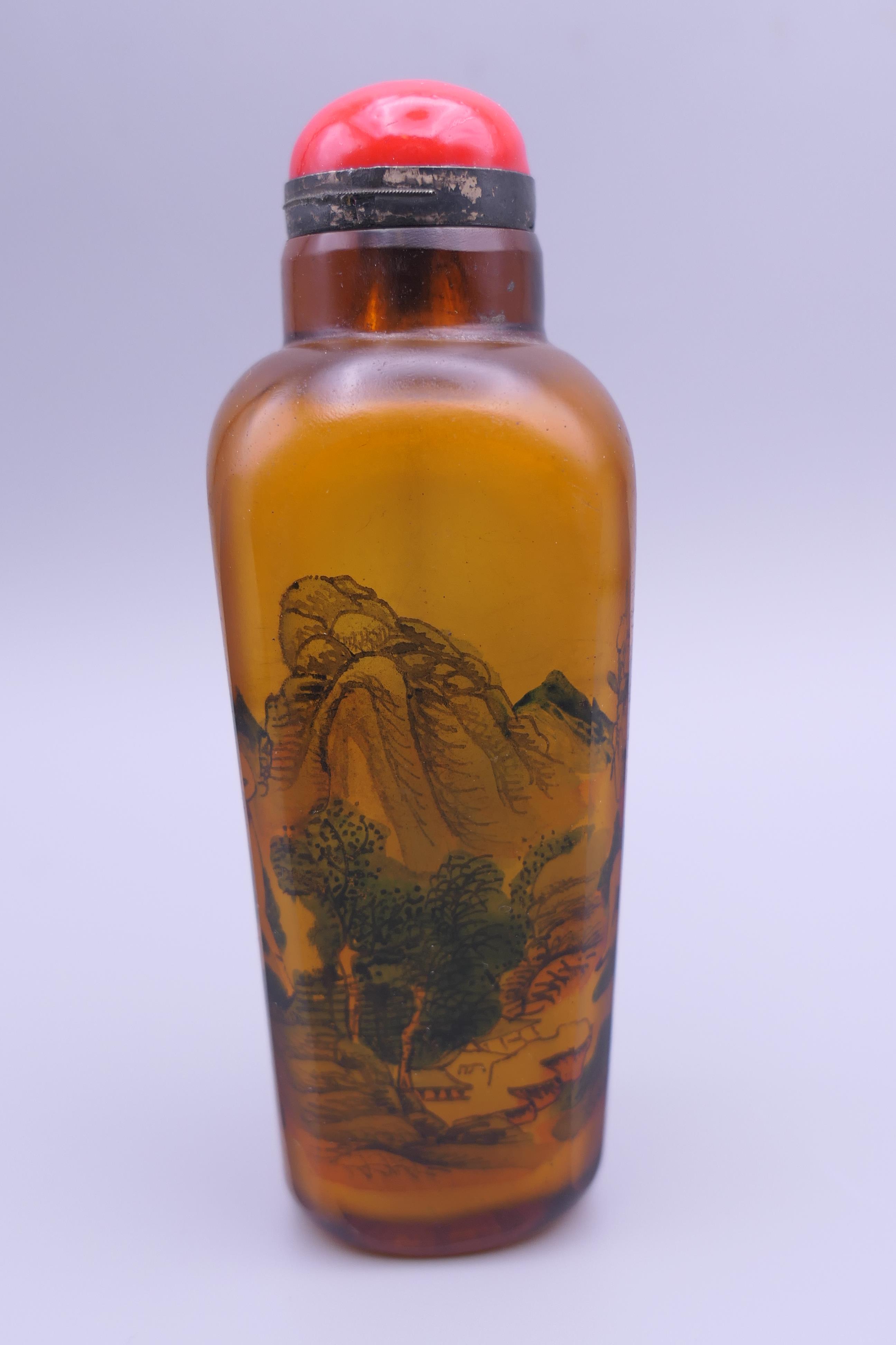 A Chinese smoky coloured interior painted snuff bottle and stopper. 11.5 cm high. - Image 4 of 6