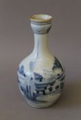 A Chinese blue and white porcelain bottle vase. 20 cm high.