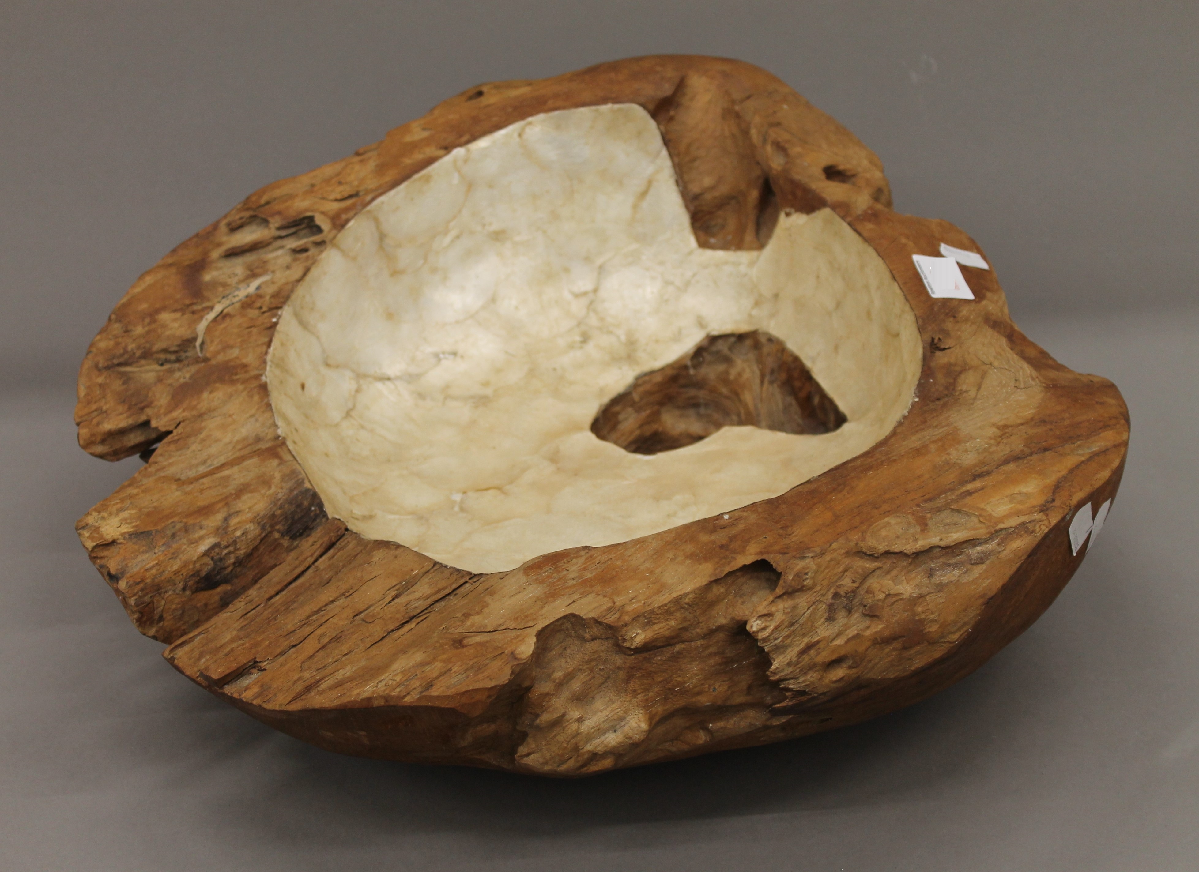 A wooden sculptural bowl. 49 cm wide.