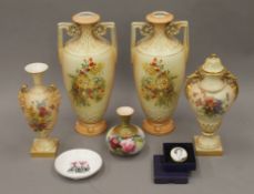 Three Royal Worcester vases, a Royal Worcester pin tray,