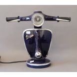 A Vespa lamp. 34.5 cm high.