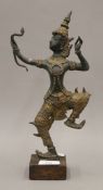 An Indian bronze model of a dancer. 31.5 cm high.