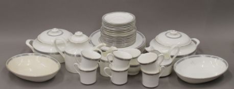 A Royal Doulton Charade pattern dinner service.