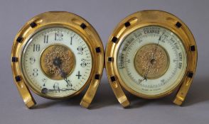 A horseshoe clock and barometer. 23.5 cm wide.