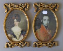 A pair of gilt framed miniatures. 24 cm high.