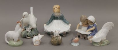 A collection of various Royal Copenhagen porcelain figures and animals. The largest 12 cm high.