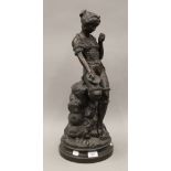 A late 19th/early 20th century bronze figure of a young girl, inscribed Gustave Rey. 57 cm high.