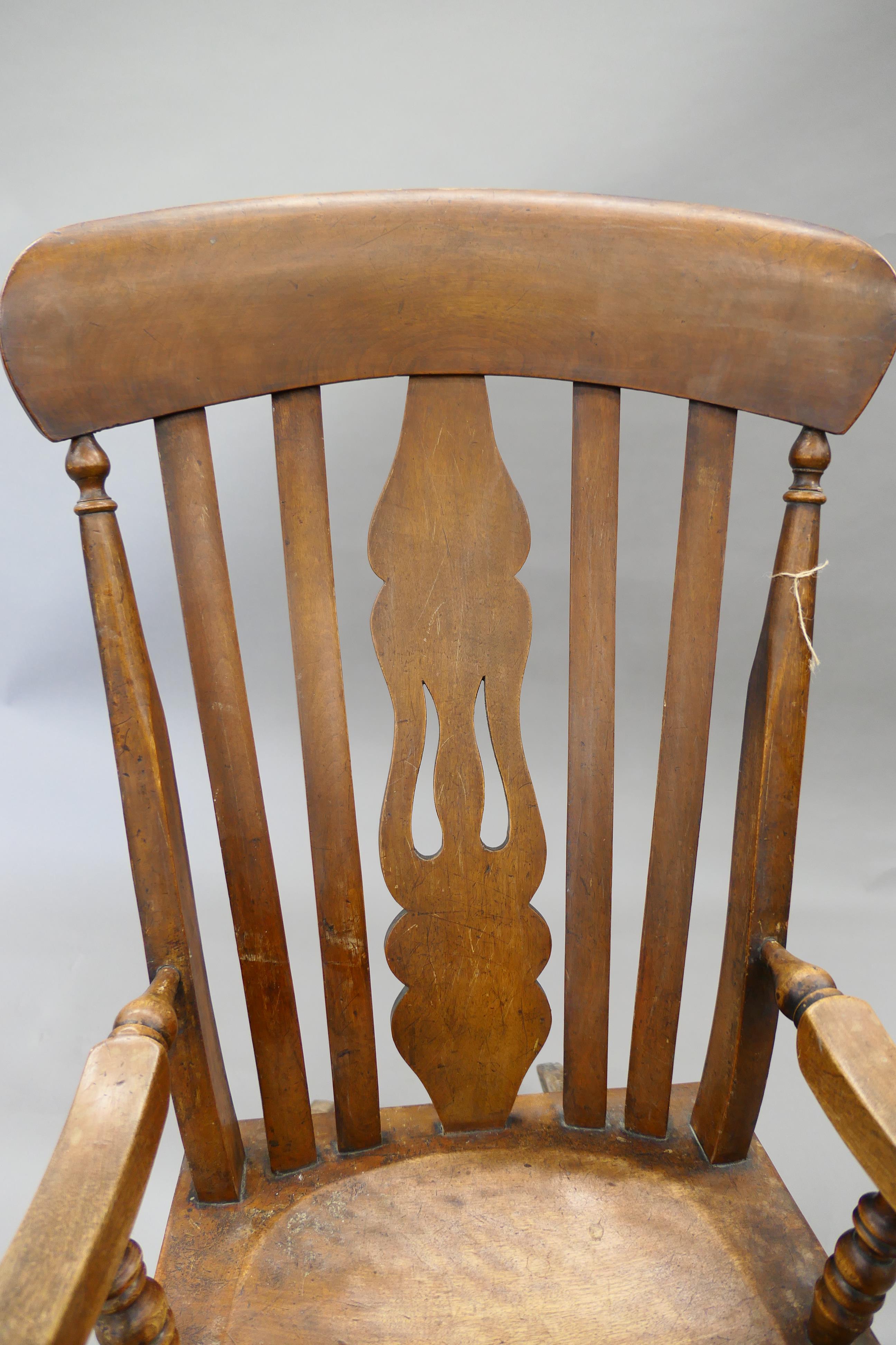 A Victorian splat back rocking chair. 53.5 cm wide. - Image 2 of 5