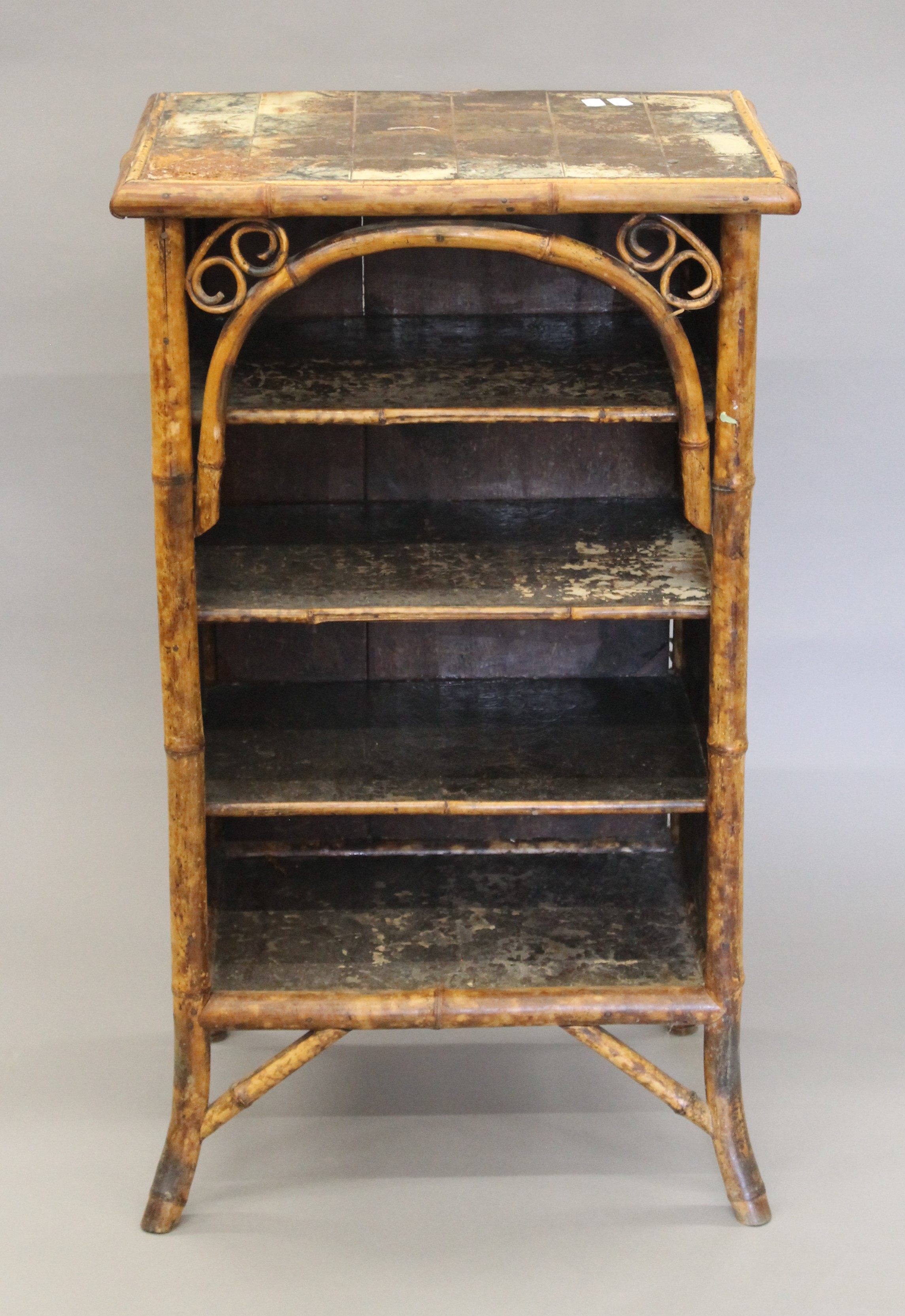 A Victorian bamboo bookcase. 53 cm wide.
