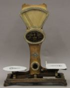 A large ornate set of grocery scales by Automatic Scale Company Altringham. 83 cm high.