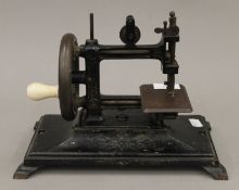 A small Victorian sewing machine. 28.5 cm long.