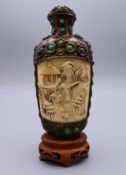 A late 19th century ivory and turquoise snuff bottle. 12.5 cm high.