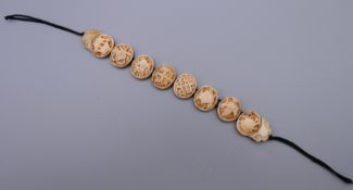 A carved bone bracelet. 16.5 cm long.